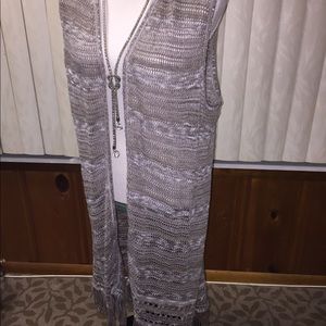 Long sleeveless earth colored cardigan
